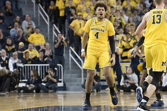 Isaiah Livers (4) and Moritz Wagner (13)