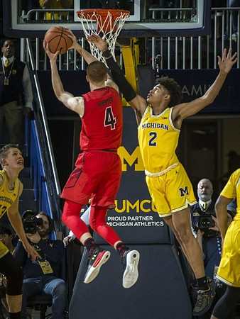 Moritz Wagner (13) and Jordan Poole (2)