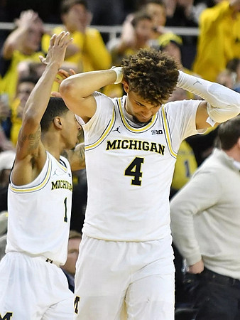 Charles Matthews (1) and Isaiah Livers (4)