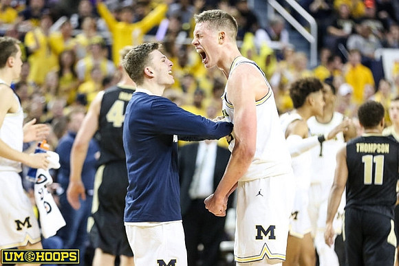 Luke Wilson (11) and Moritz Wagner (13)