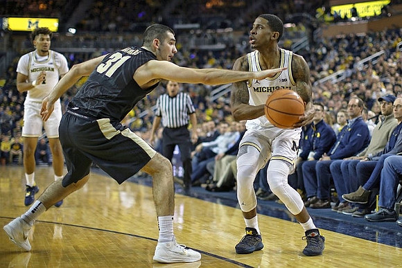 Isaiah Livers (4) and Charles Matthews (1)