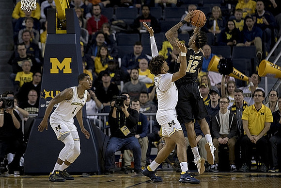Charles Matthews (1) and Isaiah Livers (4)