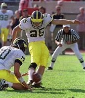 Hayden Epstein (25) and Tom Brady (10)