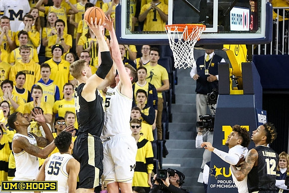 Charles Matthews (1), Eli Brooks (55), Jon Teske (15), and Isaiah Livers (4)