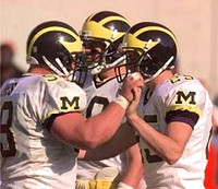 Hayden Epstein (25), Rob Renes (58), and Tom Brady (10)