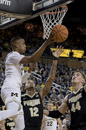 Muhammad-Ali Abdur-Rahkman (12) and Duncan Robinson (22)
