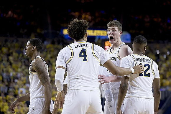 Charles Matthews (1), Isaiah Livers (4), Jon Teske (15), and Muhammad-Ali Abdur-Rahkman (12)