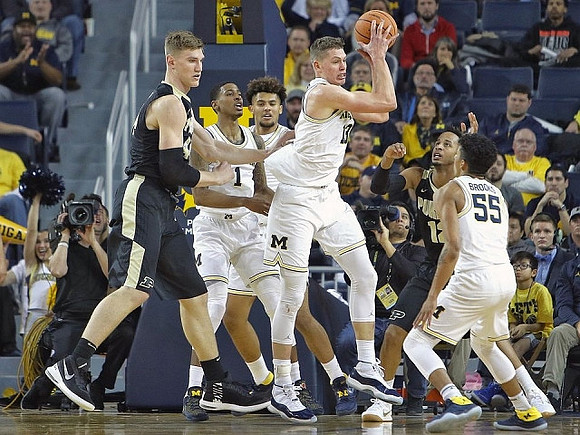 Charles Matthews (1), Isaiah Livers (4), Moritz Wagner (13), and Eli Brooks (55)