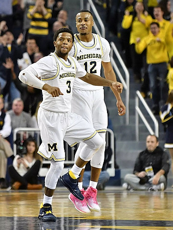 Zavier Simpson (3) and Muhammad-Ali Abdur-Rahkman (12)