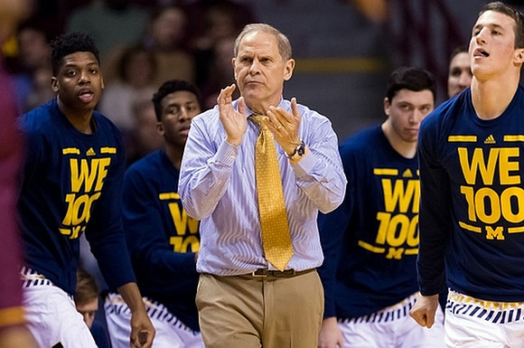 Kameron Chatman (3), Aubrey Dawkins (24), John Beilein, Sean Lonergan (20), and Andrew Dakich (11)