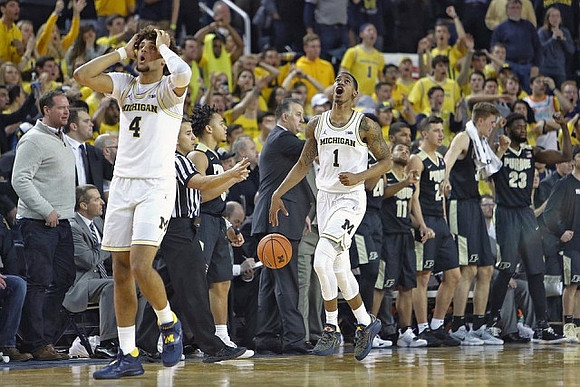 Isaiah Livers (4) and Charles Matthews (1)