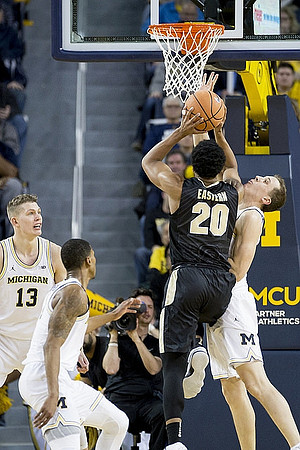Moritz Wagner (13), Charles Matthews (1), and Duncan Robinson (22)
