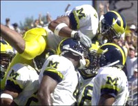 Marquise Walker (4) and Teammates