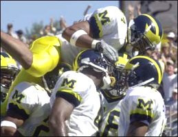 Marquise Walker (4) and Teammates