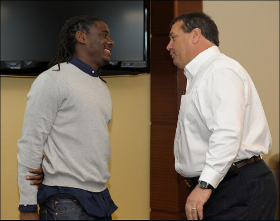 Denard Robinson and Brady Hoke