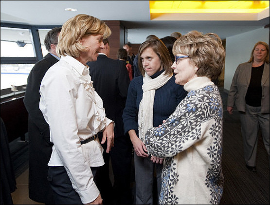 Laura Hoke, Kelly Hoke, and Mary Sue Coleman