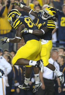Brandon Moore (89) and Vincent Smith (2)