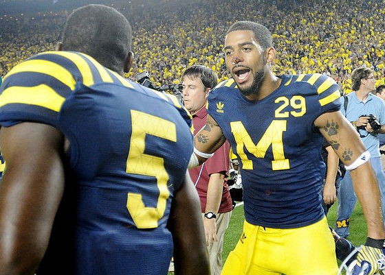 Courtney Avery (5) and Troy Woolfolk (29)