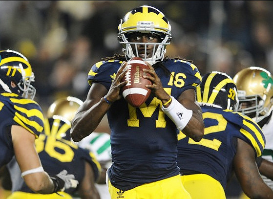 Taylor Lewan (77), Denard Robinson (16), Kevin Koger (86), and Ricky Barnum (52)