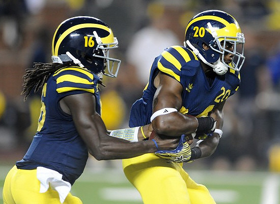 Denard Robinson (16) and Michael Shaw (20)