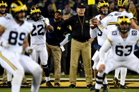 Ian Bunting (89), Karan Higdon (22), Jim Harbaugh, Wilton Speight (3), Jake Butt (88), and Ben Pliska (63)