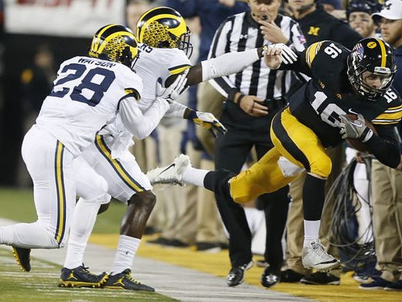 Brandon Watson (28) and Jabrill Peppers (5)