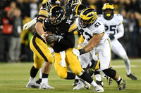 Chris Wormley (43) and Dymonte Thomas (25)