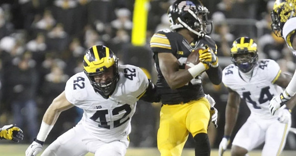 Ben Gedeon (42) and Delano Hill (44)