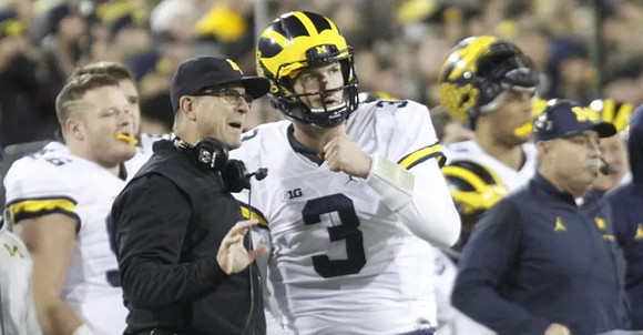 Ryan Glasgow (96), Jim Harbaugh, Wilton Speight (3), and Don Brown