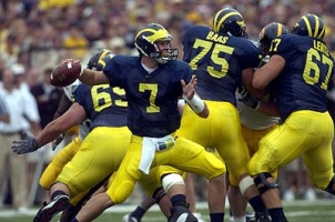 Chad Henne (7) Leo Henige (65), David Baas (75), and Matt Lentz (67)