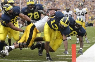 Grant Mason (13), Roy Manning (58), LaMarr Woodley (56), and Gabe Watson (78)