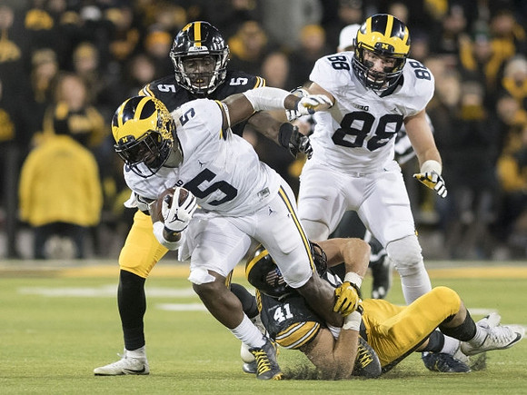 Jabrill Peppers (5) and Jake Butt (88)