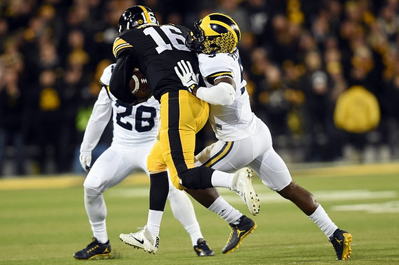 Brandon Watson (28) and Jabrill Peppers (5)