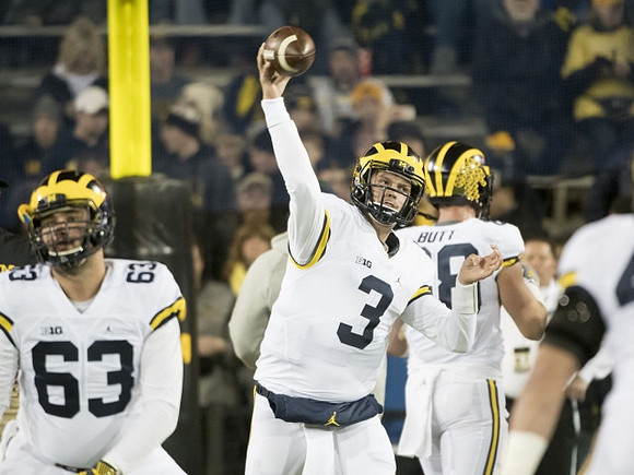 Ben Pliska (63), Wilton Speight (3), and Jake Butt (88)