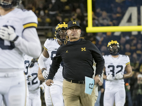 Jim Harbaugh and Ty Isaac (32)