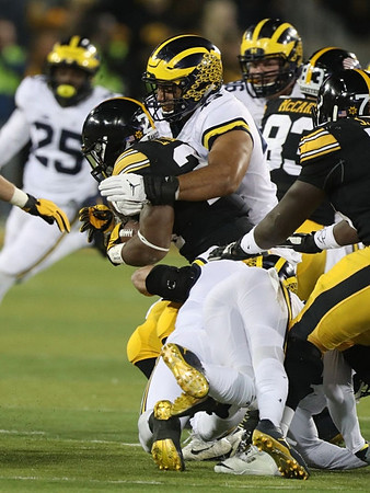 Dymonte Thomas (25), Chris Wormley (43), and Ryan Glasgow (96)