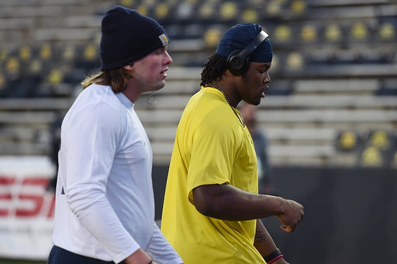 Chase Winovich (15) and Rashan Gary (3)