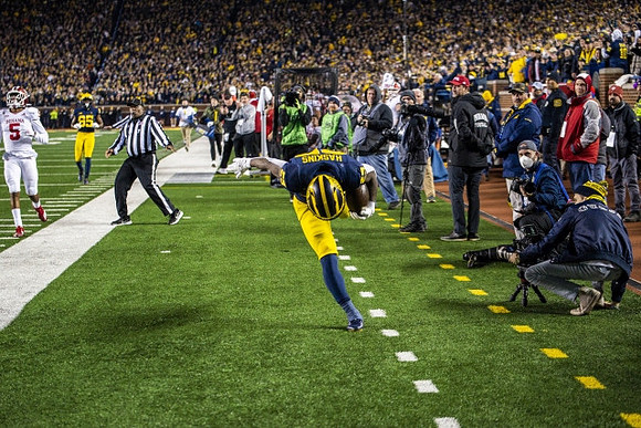 Daylen Baldwin (85) and Hassan Haskins (25)
