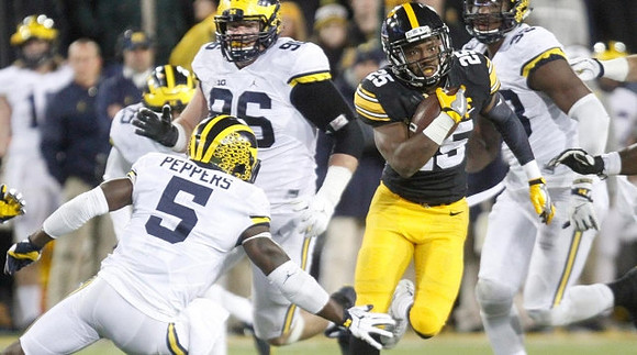 Jabrill Peppers (5), Ryan Glasgow (96), and Taco Charlton (33)