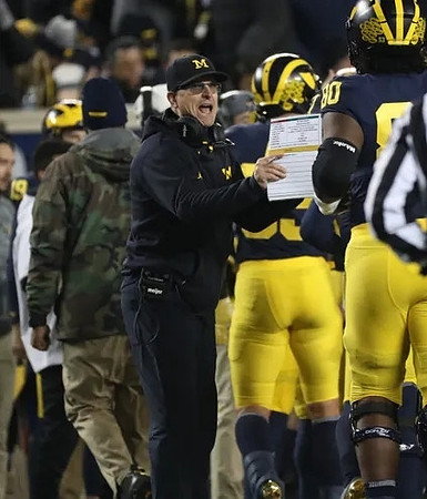 Jim Harbaugh and Trente Jones (80)
