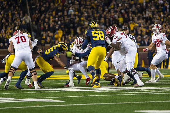 Mazi Smith (58) and Junior Colson (25)