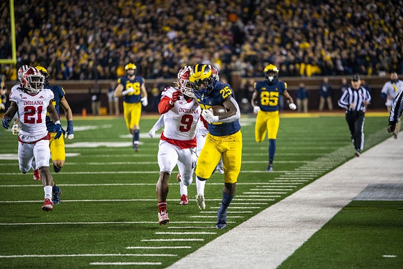 Luke Schoonmaker (86), Hassan Haskins (25), and Daylen Baldwin (85)