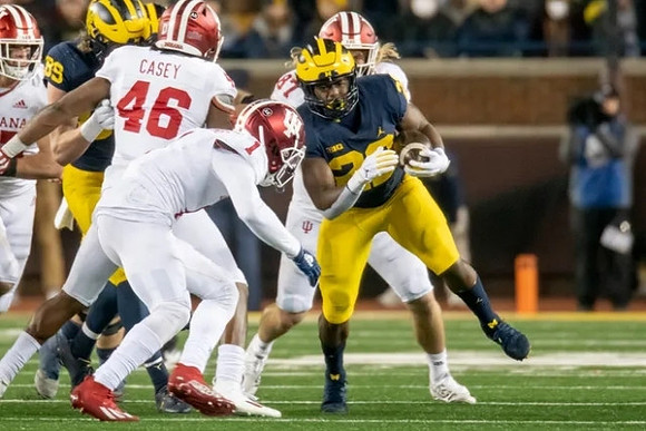 Carter Selzer (89) and Hassan Haskins (25)