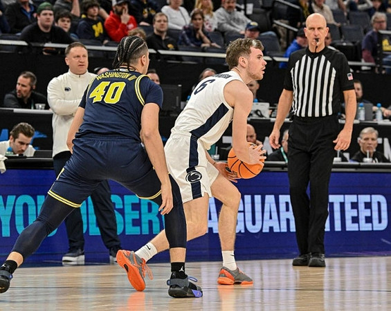 George Washington III (40) and Penn State Head Coach Mike Rhoades