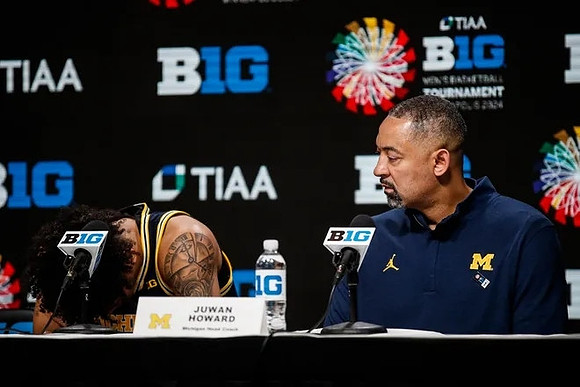 Terrance Williams II (5) and Juwan Howard