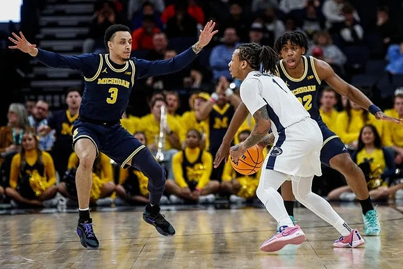 Jaelin Llewellyn (3) and Tarris Reed Jr. (32)