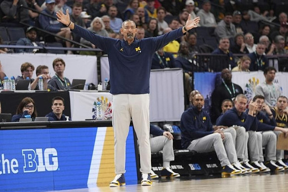 Juwan Howard and Michigan Team