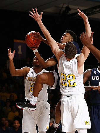 Zak Irvin (21) and Duncan Robinson (22)