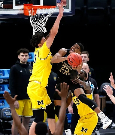 Brandon Johns Jr. (23) and Chaundee Brown Jr. (15)