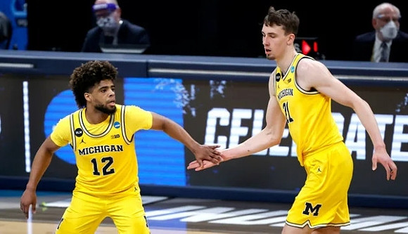 Mike Smith (12) and Franz Wagner (21)